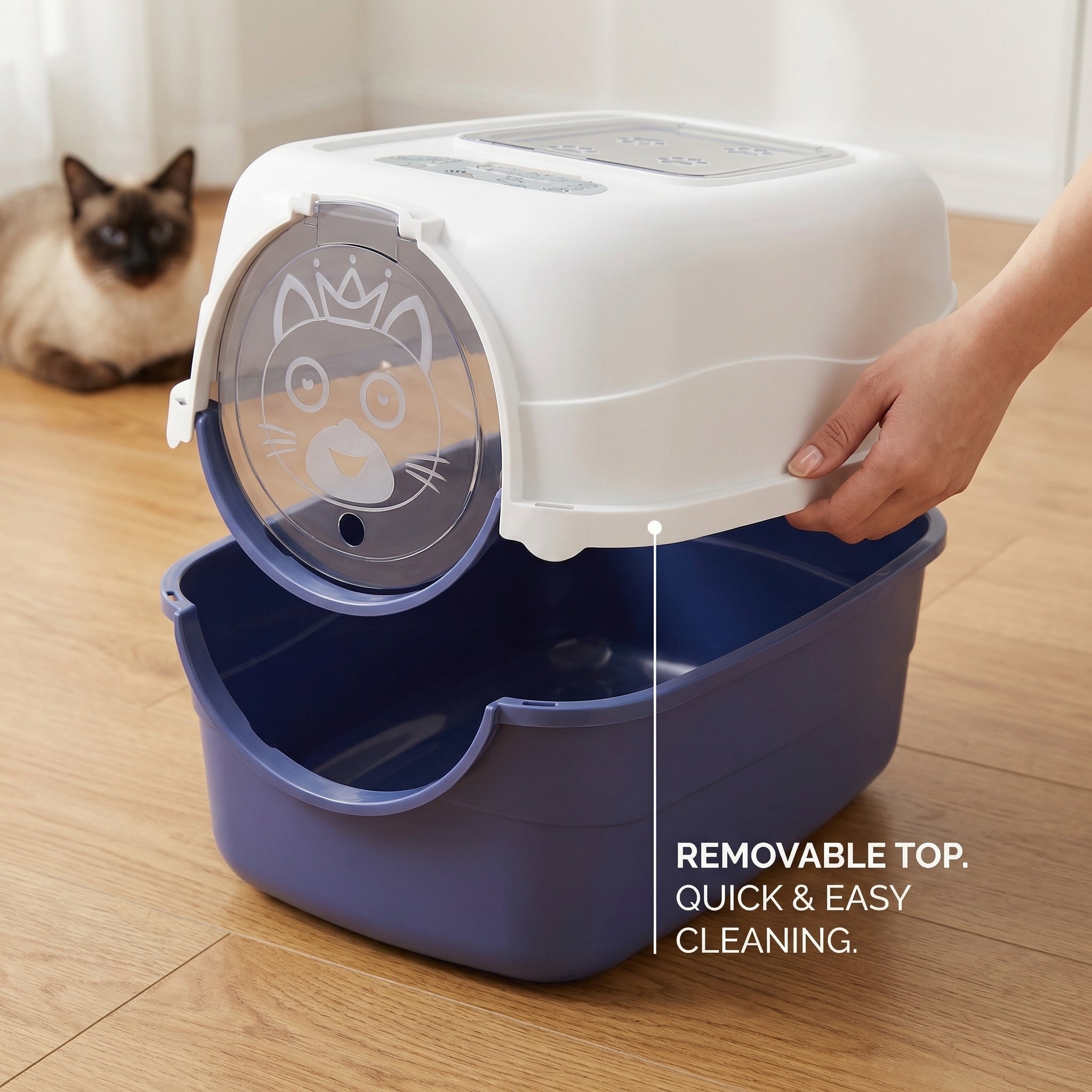 Hand removing Felinabox enclosed litter box top section for quick and hygienic daily cleaning